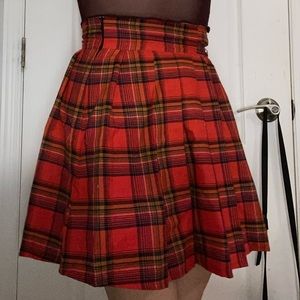 Red plaid high rise skirt with metal belt detail